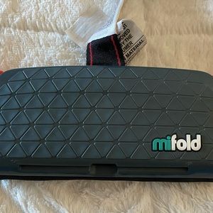 Mifold portable travel car seat. Small compact.